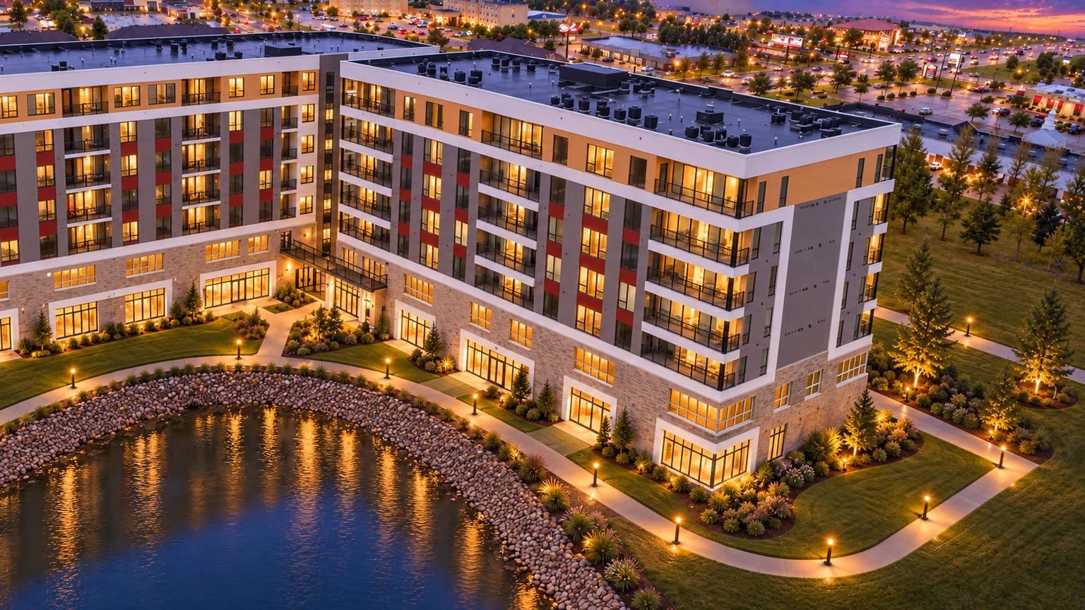 Dusk marketing visualization of 4470 MAKT's pond-facing exterior.